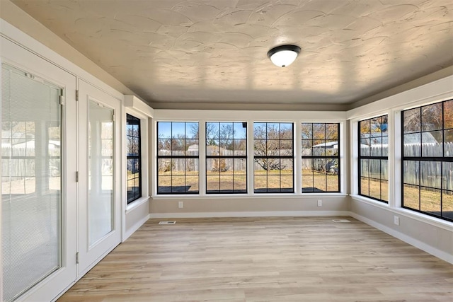 view of unfurnished sunroom