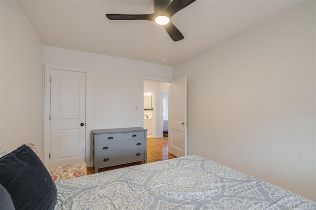 bedroom with hardwood / wood-style flooring and ceiling fan