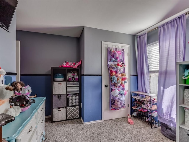 game room with light colored carpet