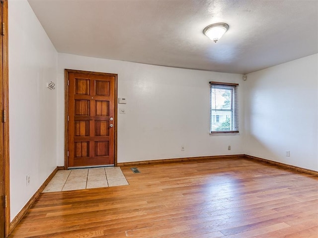 foyer entrance featuring light hardwood / wood-style floors