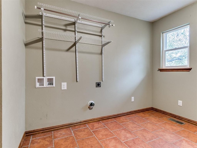 laundry area with washer hookup and electric dryer hookup