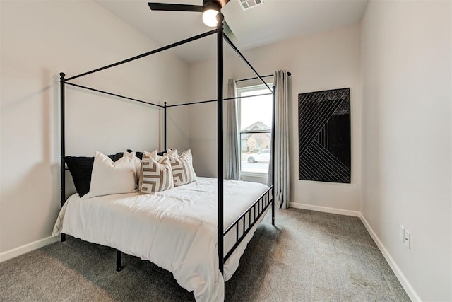 bedroom with ceiling fan and carpet