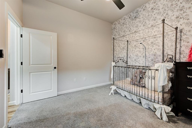 unfurnished bedroom with carpet floors and ceiling fan