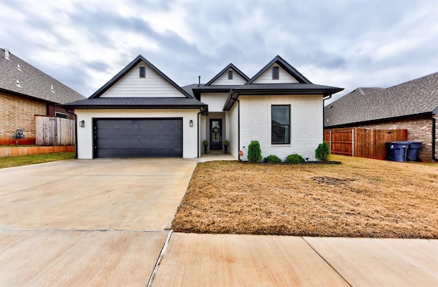 view of front of property with a garage