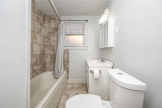 full bathroom featuring shower / tub combo, vanity, and toilet