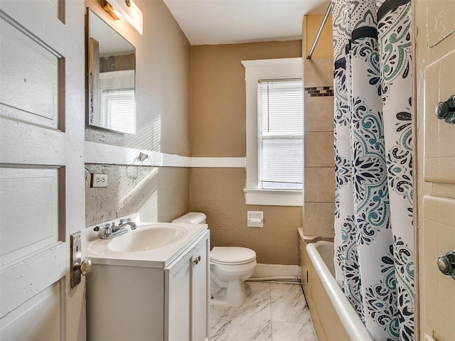 full bathroom featuring vanity, toilet, and shower / tub combo