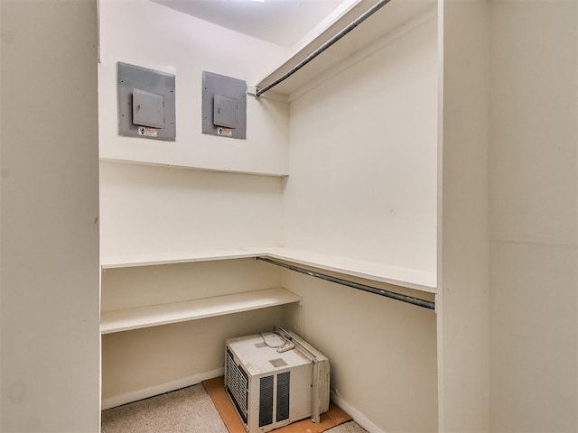 spacious closet featuring electric panel