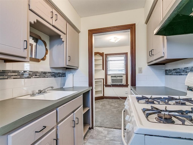 kitchen featuring backsplash, cooling unit, sink, gray cabinets, and white range with gas cooktop