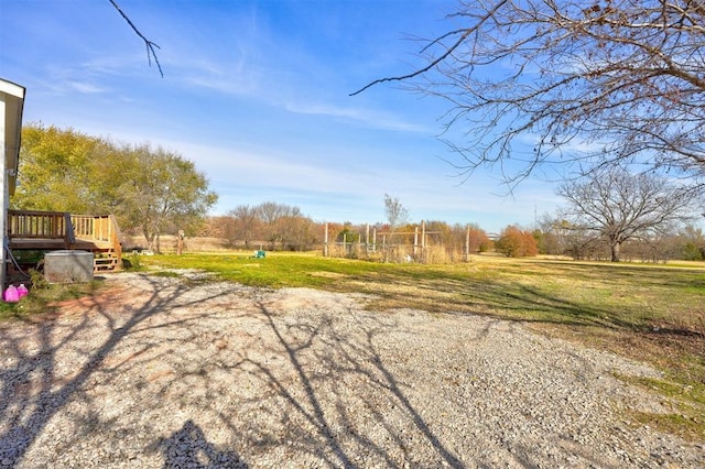 view of yard with a deck