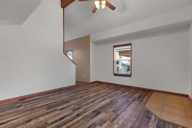 interior space with beam ceiling, high vaulted ceiling, ceiling fan, and dark wood-type flooring