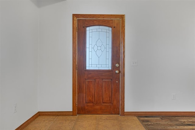 view of tiled foyer entrance