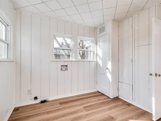 laundry area featuring light wood-type flooring and hookup for a washing machine