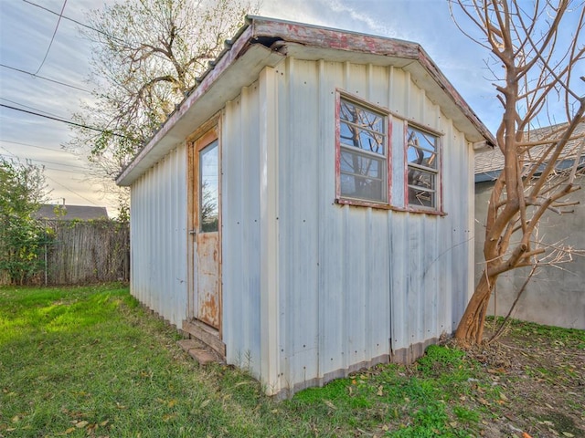 view of outdoor structure featuring a yard