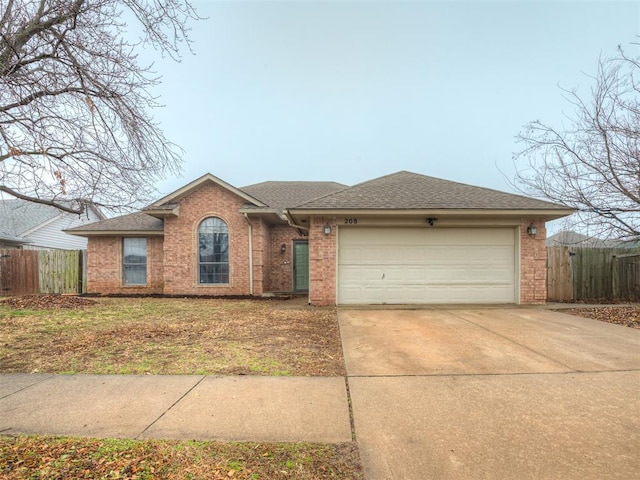 single story home with a garage