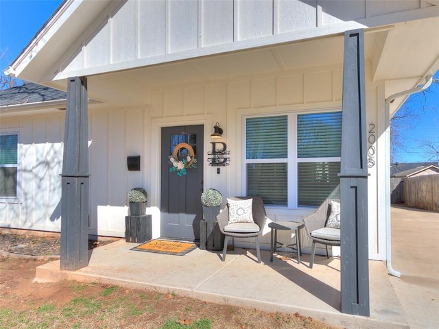 entrance to property featuring board and batten siding