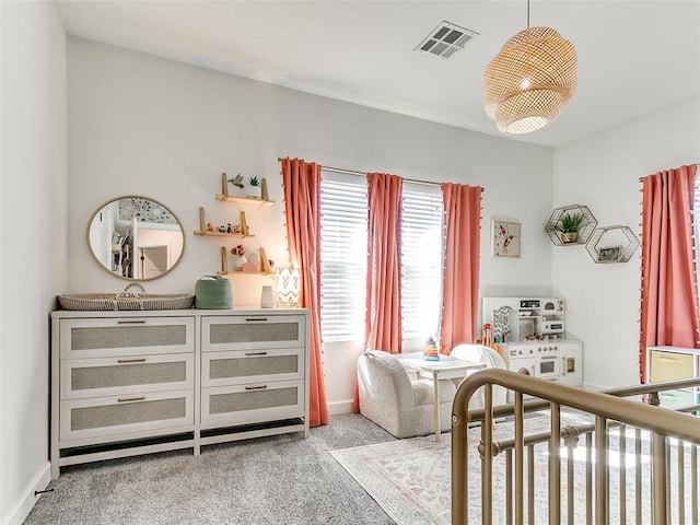 bedroom featuring carpet, visible vents, and baseboards