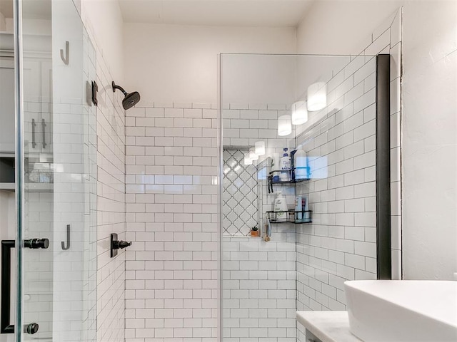 full bathroom featuring a shower stall