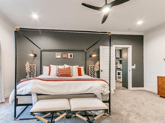 carpeted bedroom with a ceiling fan, baseboards, crown molding, and recessed lighting