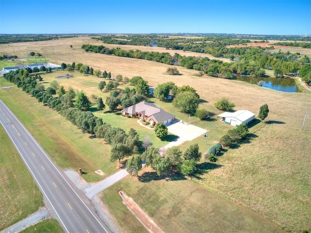 bird's eye view featuring a rural view and a water view