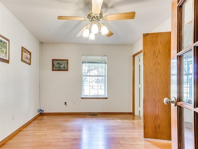 826 S Mustang Rd, Tuttle, OK 73089 - empty room with light wood-style flooring and a ceiling fan
