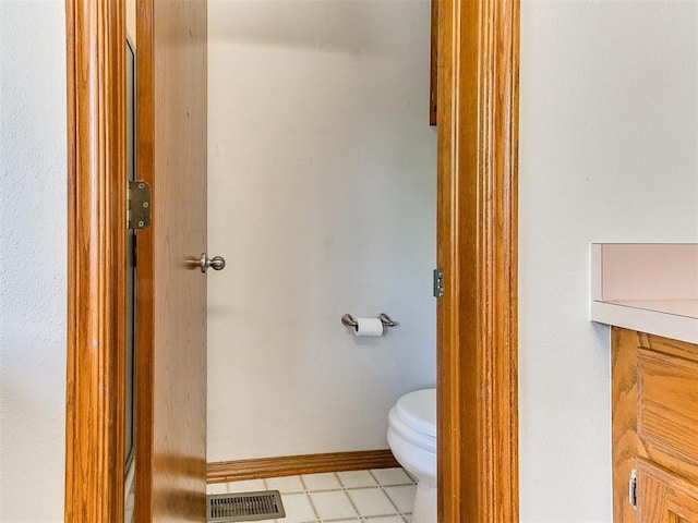 826 S Mustang Rd, Tuttle, OK 73089 - bathroom with toilet and baseboards