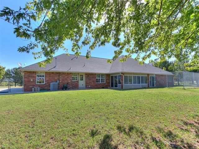 826 S Mustang Rd, Tuttle, OK 73089 - back of house featuring brick siding