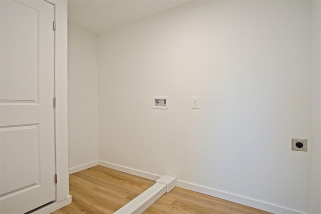 laundry room featuring hardwood / wood-style flooring, hookup for a washing machine, and hookup for an electric dryer