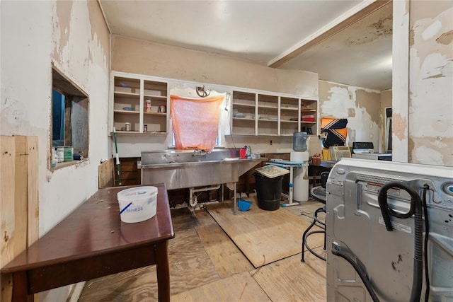 miscellaneous room featuring washer / dryer