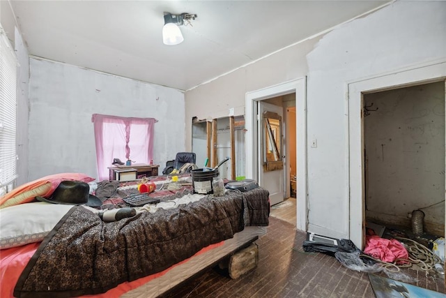 bedroom featuring hardwood / wood-style floors