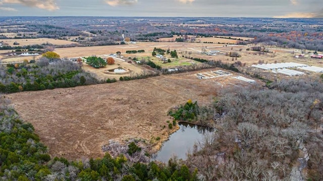 bird's eye view featuring a water view and a rural view