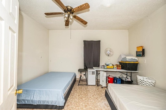 bedroom featuring carpet, a textured ceiling, and ceiling fan