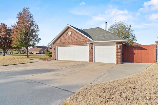 view of side of property featuring a garage