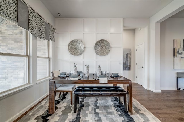 dining area featuring hardwood / wood-style floors