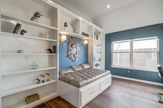 mudroom featuring hardwood / wood-style flooring and lofted ceiling