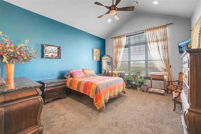 carpeted bedroom featuring ceiling fan and vaulted ceiling