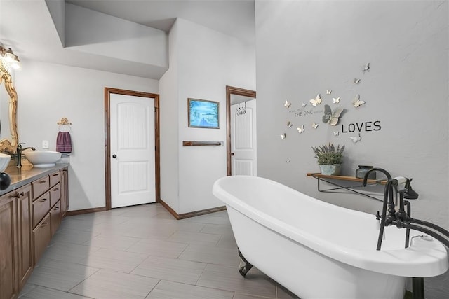 bathroom featuring a bathing tub and vanity