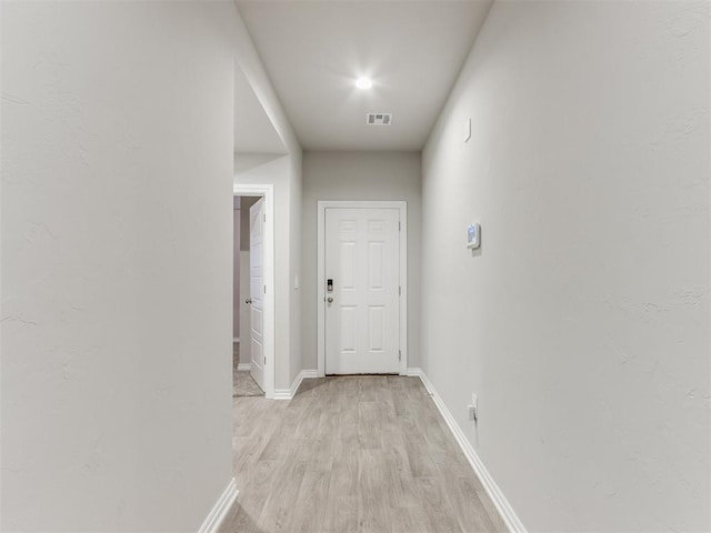 hall featuring light hardwood / wood-style flooring