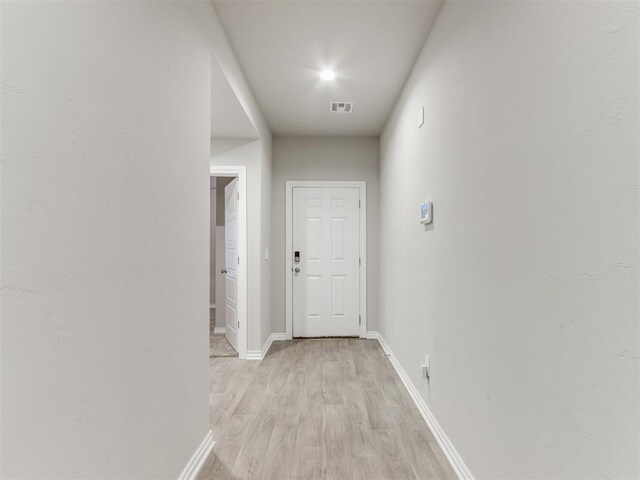 4408 Moonlight Rd, Mustang, OK 73064 - hall with light wood-type flooring and baseboards