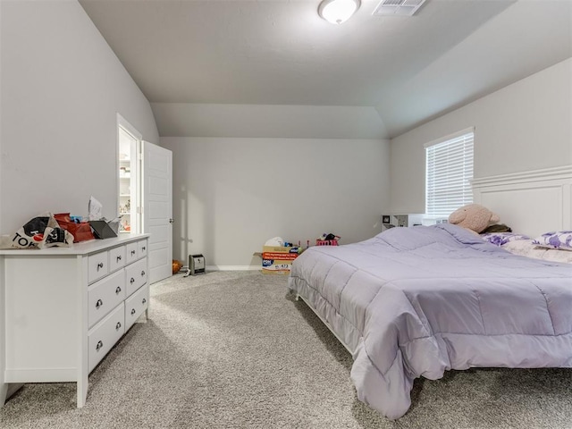 4408 Moonlight Rd, Mustang, OK 73064 - bedroom featuring lofted ceiling and light carpet