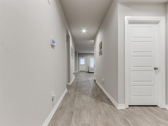 hall featuring light hardwood / wood-style flooring