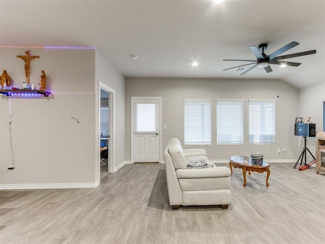 4408 Moonlight Rd, Mustang, OK 73064 - living room with ceiling fan, wood finished floors, plenty of natural light, and vaulted ceiling