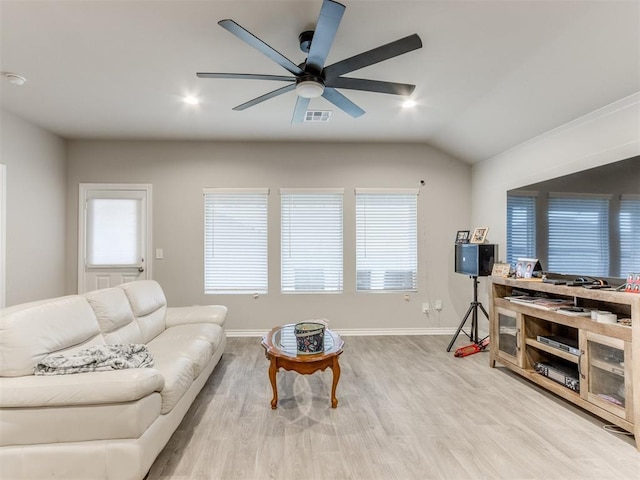 living room featuring light hardwood / wood-style flooring, ceiling fan, and lofted ceiling