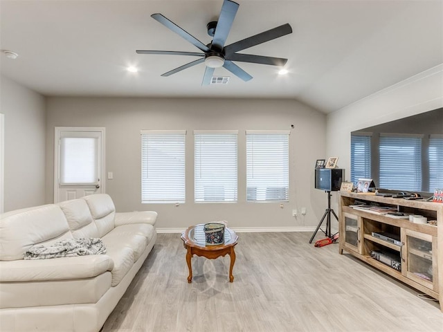 4408 Moonlight Rd, Mustang, OK 73064 - living room featuring a ceiling fan, wood finished floors, healthy amount of natural light, and vaulted ceiling