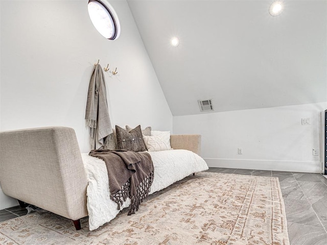 sitting room featuring lofted ceiling