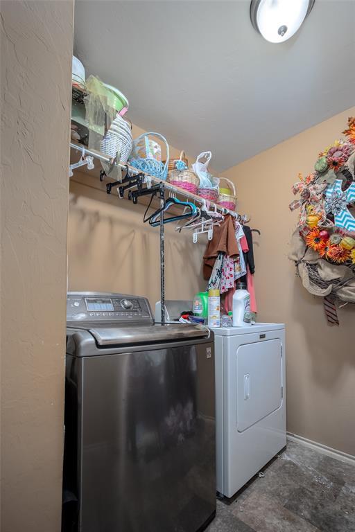 laundry area featuring separate washer and dryer