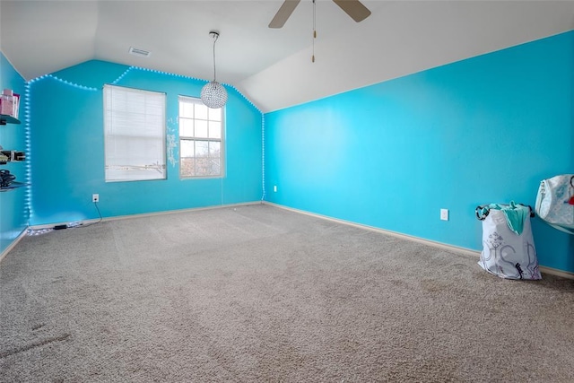 additional living space featuring ceiling fan, carpet floors, and vaulted ceiling