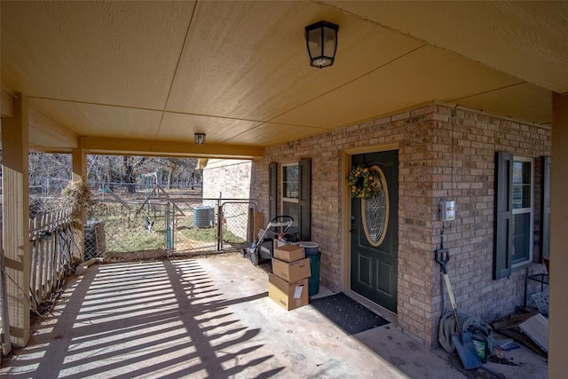 view of exterior entry featuring central AC