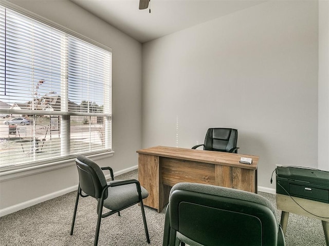 home office featuring carpet and ceiling fan