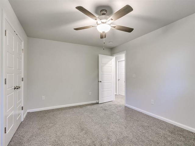 unfurnished bedroom featuring ceiling fan