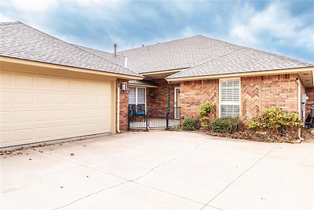 single story home featuring a garage